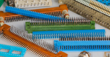 Heap of various electrical connectors for different purposes, selective focus